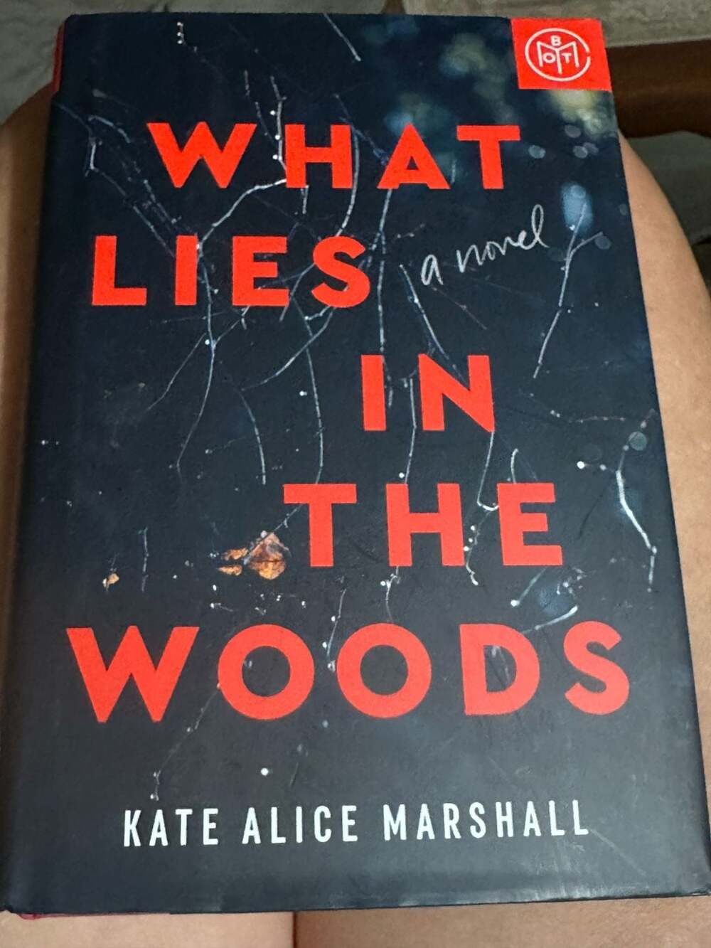 What Lies in the Woods by Kate Alice Marshall Hardcover Book, Book of the Month)